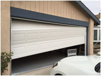 Check Out How to Install Garage Door Cables image repair-a-garage-door-cable Check Out How to Install Garage Door Cables