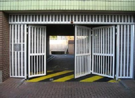 Gates for garage and warehouse doors - Door Doctor image Door Doctor